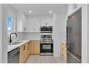 45 Templemont Drive Ne, Calgary, AB  - Indoor Photo Showing Kitchen With Stainless Steel Kitchen With Double Sink With Upgraded Kitchen 