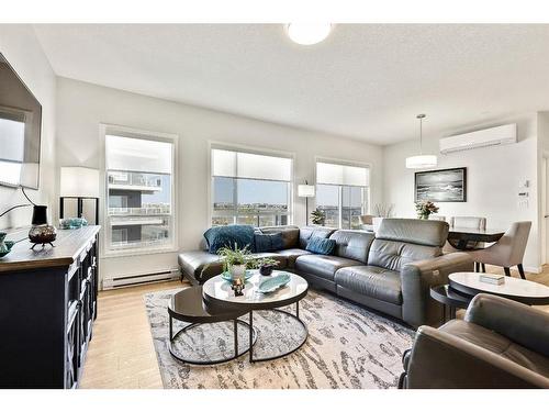 1301-220 Seton Grove Se, Calgary, AB - Indoor Photo Showing Living Room