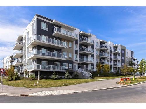 1301-220 Seton Grove Se, Calgary, AB - Outdoor With Balcony With Facade