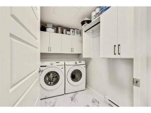 1301-220 Seton Grove Se, Calgary, AB - Indoor Photo Showing Laundry Room