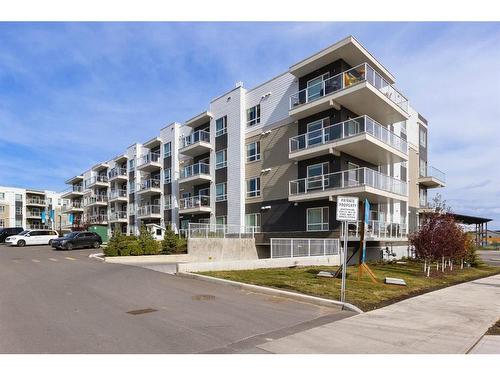 1301-220 Seton Grove Se, Calgary, AB - Outdoor With Balcony With Facade