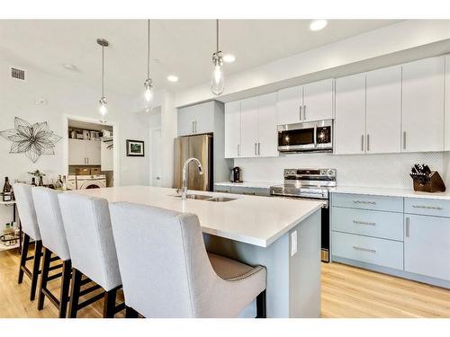 1301-220 Seton Grove Se, Calgary, AB - Indoor Photo Showing Kitchen With Stainless Steel Kitchen With Upgraded Kitchen