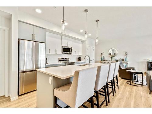 1301-220 Seton Grove Se, Calgary, AB - Indoor Photo Showing Kitchen With Stainless Steel Kitchen With Upgraded Kitchen