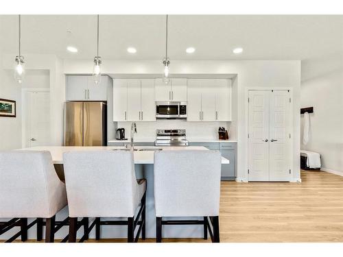 1301-220 Seton Grove Se, Calgary, AB - Indoor Photo Showing Kitchen With Stainless Steel Kitchen With Upgraded Kitchen