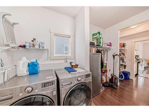 62 Valley Pointe Bay Nw, Calgary, AB - Indoor Photo Showing Laundry Room