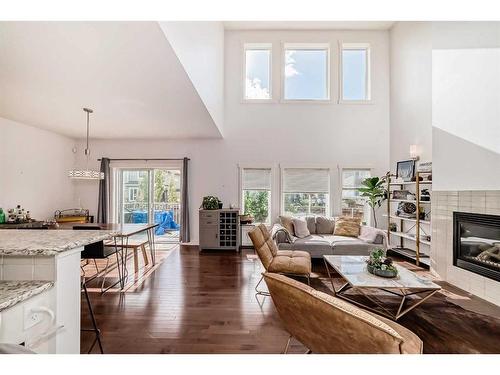 62 Valley Pointe Bay Nw, Calgary, AB - Indoor Photo Showing Living Room With Fireplace