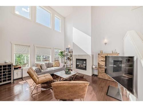 62 Valley Pointe Bay Nw, Calgary, AB - Indoor Photo Showing Living Room With Fireplace