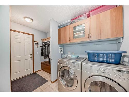 618 Rocky Ridge View Nw, Calgary, AB - Indoor Photo Showing Laundry Room