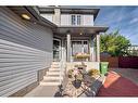 618 Rocky Ridge View Nw, Calgary, AB  - Outdoor With Deck Patio Veranda With Exterior 