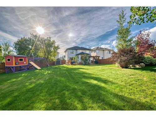 618 Rocky Ridge View Nw, Calgary, AB - Outdoor With Backyard