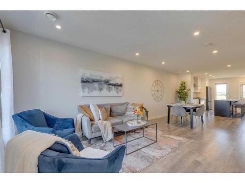 211-260 Rowley Way Nw, Calgary, AB - Indoor Photo Showing Living Room