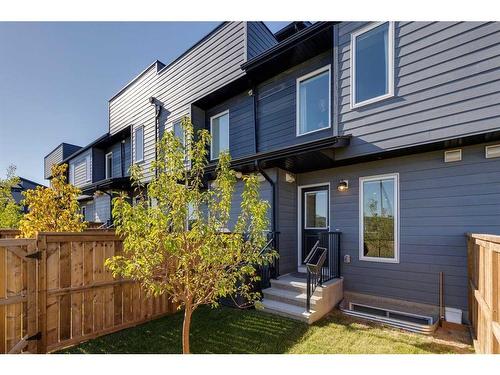 211-260 Rowley Way Nw, Calgary, AB - Outdoor With Deck Patio Veranda With Exterior