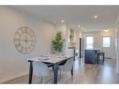 211-260 Rowley Way Nw, Calgary, AB - Indoor Photo Showing Dining Room