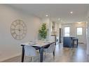 211-260 Rowley Way Nw, Calgary, AB  - Indoor Photo Showing Dining Room 