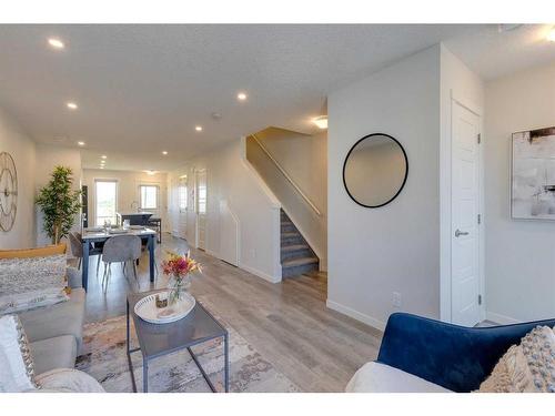 211-260 Rowley Way Nw, Calgary, AB - Indoor Photo Showing Living Room