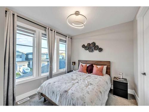 1 Rock Lake Point Nw, Calgary, AB - Indoor Photo Showing Bedroom