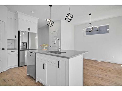 305 Ambleton Drive Nw, Calgary, AB - Indoor Photo Showing Kitchen With Double Sink With Upgraded Kitchen