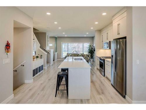 1245 Carrington Boulevard Nw, Calgary, AB - Indoor Photo Showing Kitchen With Upgraded Kitchen