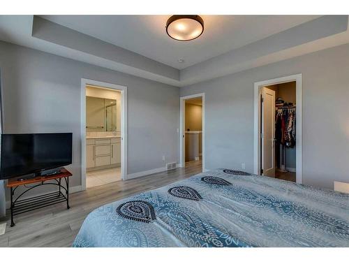 1245 Carrington Boulevard Nw, Calgary, AB - Indoor Photo Showing Bedroom