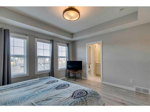 1245 Carrington Boulevard Nw, Calgary, AB - Indoor Photo Showing Bedroom