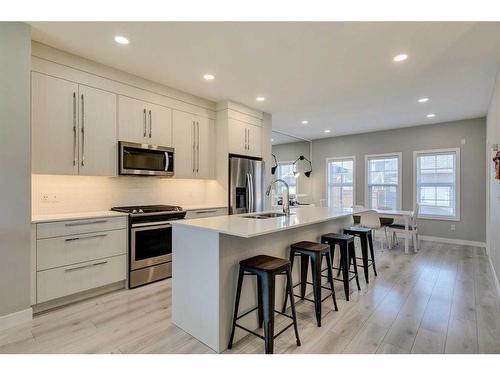 1245 Carrington Boulevard Nw, Calgary, AB - Indoor Photo Showing Kitchen With Upgraded Kitchen