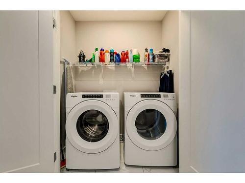 1245 Carrington Boulevard Nw, Calgary, AB - Indoor Photo Showing Laundry Room