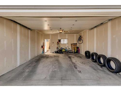 1245 Carrington Boulevard Nw, Calgary, AB - Indoor Photo Showing Garage