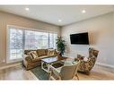 1245 Carrington Boulevard Nw, Calgary, AB  - Indoor Photo Showing Living Room 