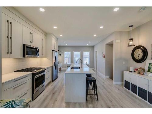 1245 Carrington Boulevard Nw, Calgary, AB - Indoor Photo Showing Kitchen With Upgraded Kitchen