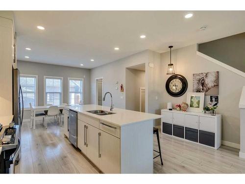 1245 Carrington Boulevard Nw, Calgary, AB - Indoor Photo Showing Kitchen With Double Sink