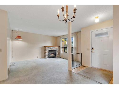 6355 Ranchview Drive Nw, Calgary, AB - Indoor With Fireplace