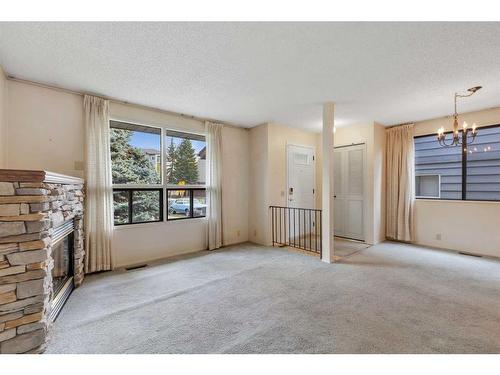 6355 Ranchview Drive Nw, Calgary, AB - Indoor With Fireplace