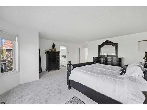 1360 Shawnee Road Sw, Calgary, AB - Indoor Photo Showing Bedroom