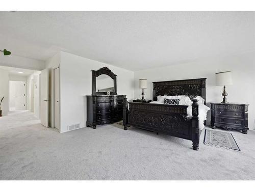 1360 Shawnee Road Sw, Calgary, AB - Indoor Photo Showing Bedroom