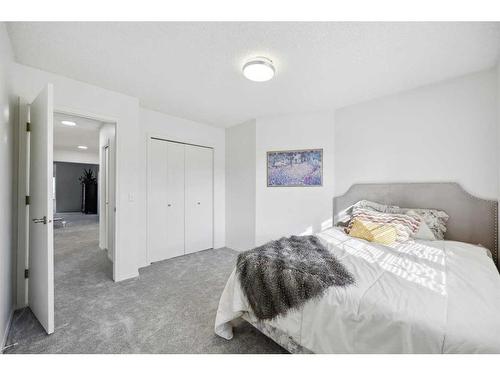 1360 Shawnee Road Sw, Calgary, AB - Indoor Photo Showing Bedroom