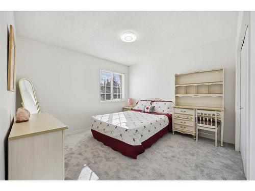 1360 Shawnee Road Sw, Calgary, AB - Indoor Photo Showing Bedroom