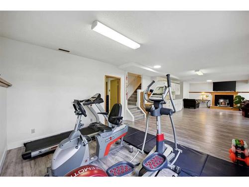 1360 Shawnee Road Sw, Calgary, AB - Indoor Photo Showing Gym Room