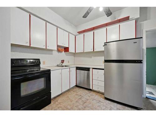 906 8 Avenue Se, Calgary, AB - Indoor Photo Showing Kitchen