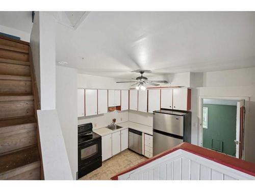 906 8 Avenue Se, Calgary, AB - Indoor Photo Showing Kitchen