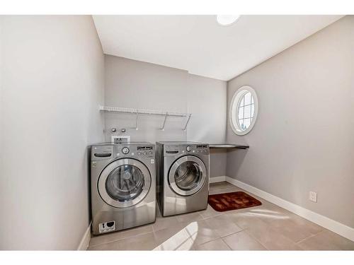 113 West Coach Place Sw, Calgary, AB - Indoor Photo Showing Laundry Room