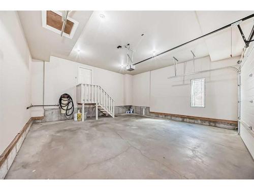 113 West Coach Place Sw, Calgary, AB - Indoor Photo Showing Garage