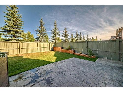 113 West Coach Place Sw, Calgary, AB - Outdoor With Backyard