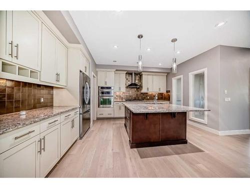 113 West Coach Place Sw, Calgary, AB - Indoor Photo Showing Kitchen With Upgraded Kitchen