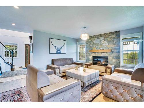 31055 Elbow River Drive, Rural Rocky View County, AB - Indoor Photo Showing Living Room With Fireplace