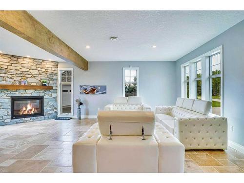 31055 Elbow River Drive, Rural Rocky View County, AB - Indoor Photo Showing Living Room With Fireplace