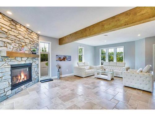 31055 Elbow River Drive, Rural Rocky View County, AB - Indoor Photo Showing Living Room With Fireplace