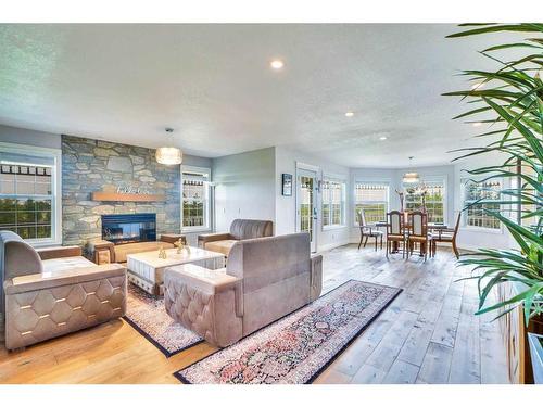 31055 Elbow River Drive, Rural Rocky View County, AB - Indoor Photo Showing Living Room With Fireplace