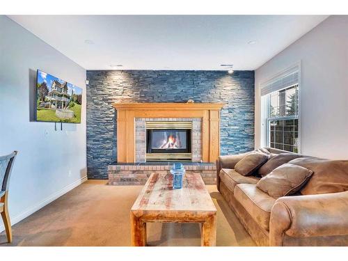 31055 Elbow River Drive, Rural Rocky View County, AB - Indoor Photo Showing Living Room With Fireplace