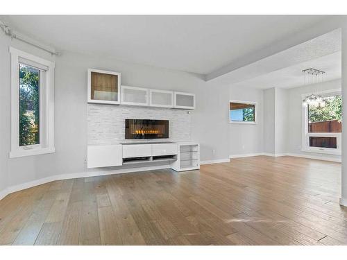 50 Shawbrooke Crescent Sw, Calgary, AB - Indoor Photo Showing Living Room With Fireplace