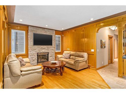 244 Country Hills Court Nw, Calgary, AB - Indoor Photo Showing Living Room With Fireplace